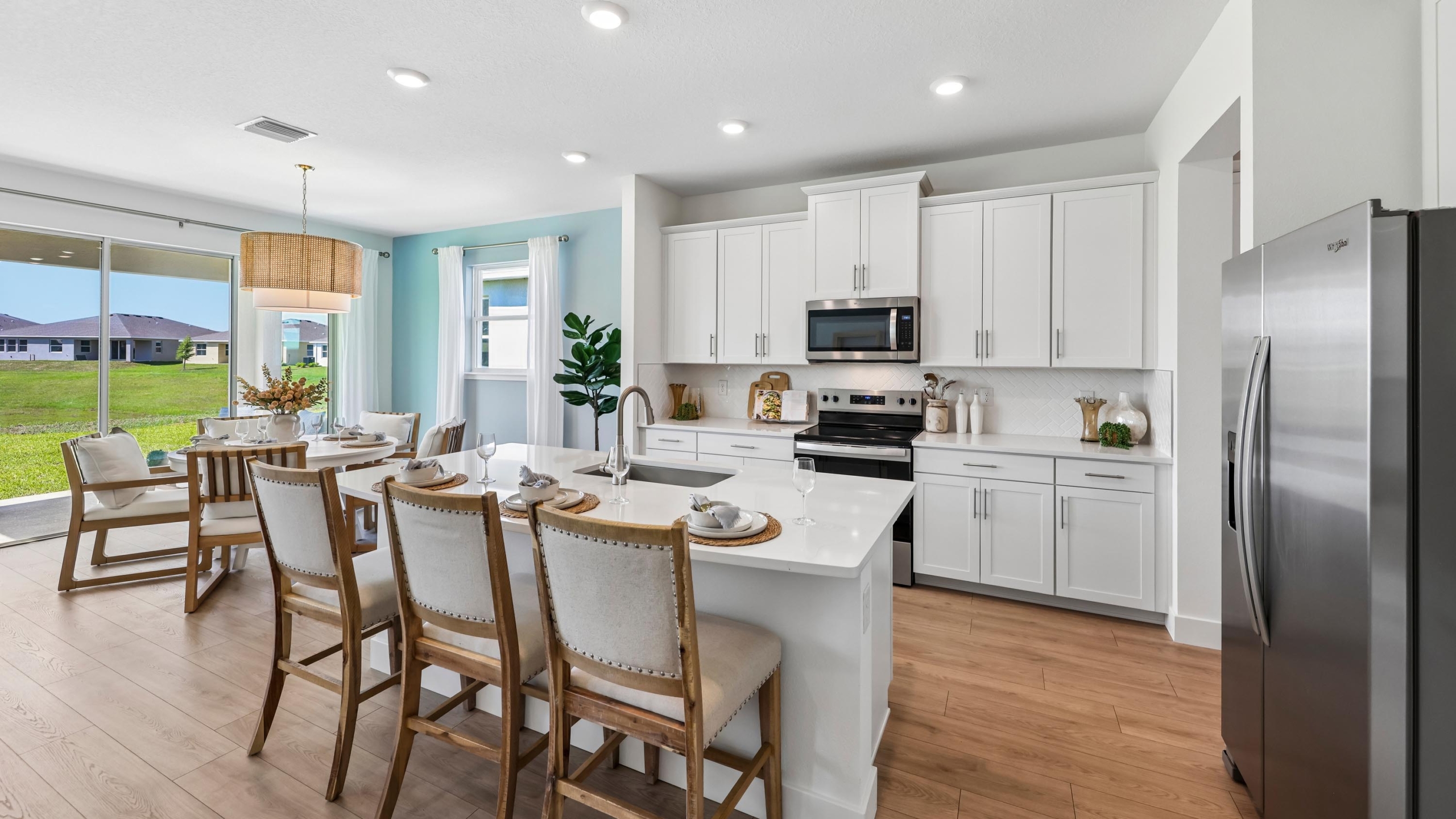 The Holden Model - kitchen with Island and Stainless Steel Appliances